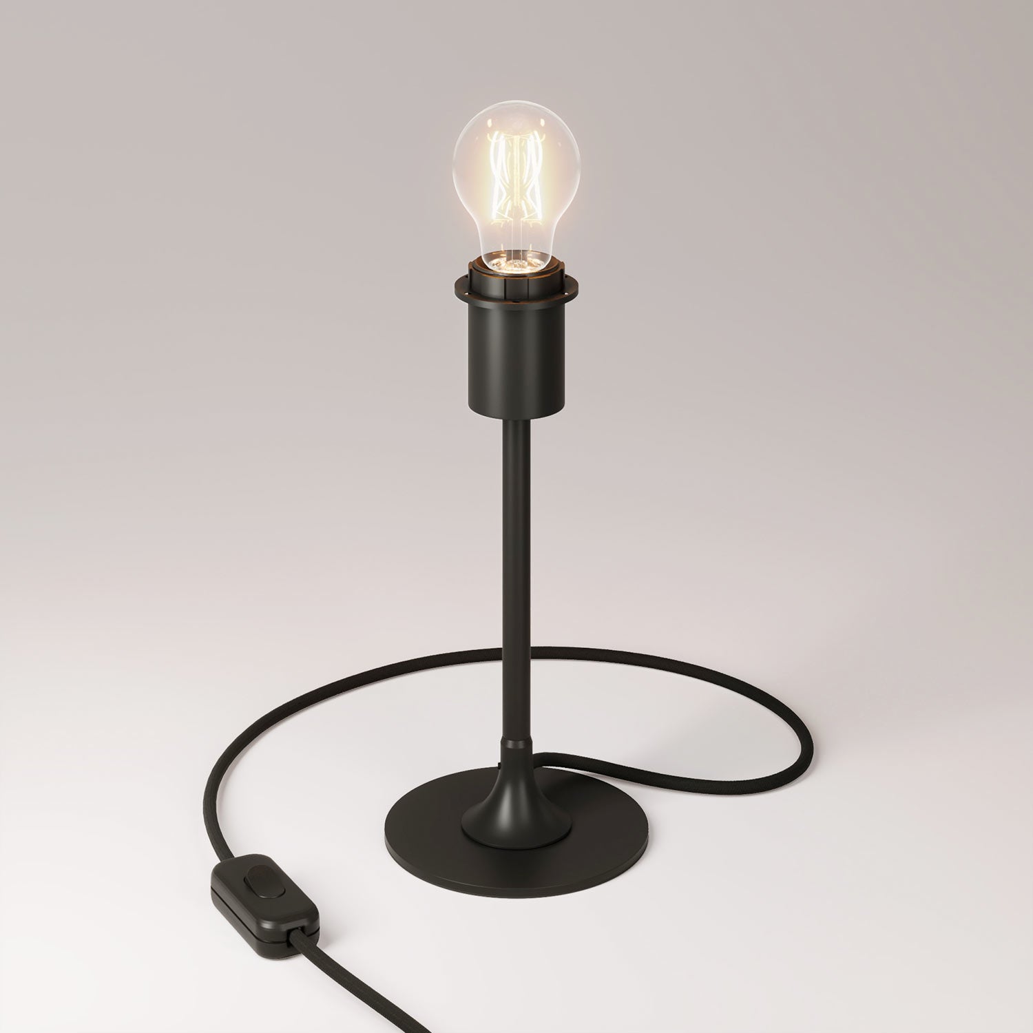 Lampada da tavolo MAG-Y con base metallica tonda, predisposizione per paralume e spina UK - Nero